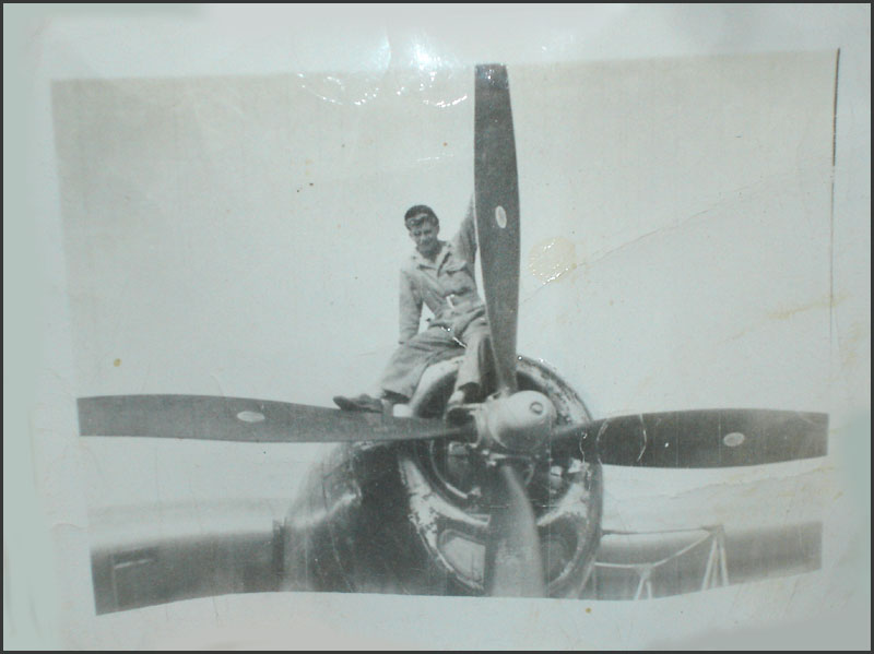Kert Ingraham atop one of the engines of the Enola Gay. (Photo courtesy Kurt Ingraham)