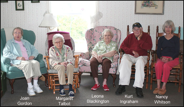 Kert Ingraham, second from right, pictured with the residents of 63 Washington St. in Camden. not pictured is resident Bob Seavey. (Photo by Chris Wolf)