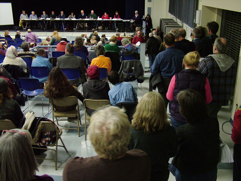 Roughly 40 citizens lined up to address the Planning Board during the final public hearing on a controversial propane terminal proposed for construction in Searsport. (Photo by Ethan Andrews)