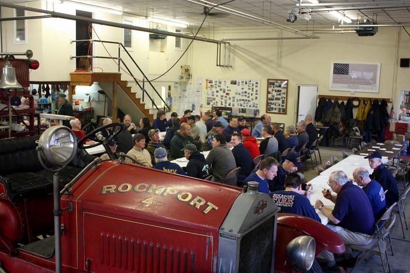 Rockport firefighters past and present share breakfast with retiring Chief Bruce Woodward. (Photo by Holly S. Edwards)