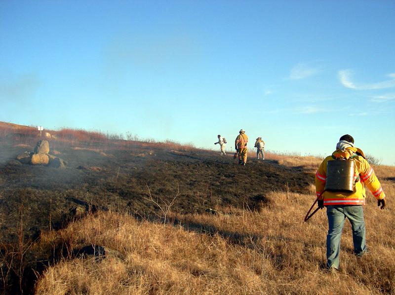 Bruce Woodward has seen his share of grass and woods fires, including this one on Beech Hill started by an errant toy rocket science experiment. (Contributed photo)
