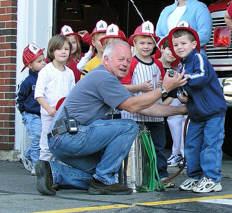 Bruce Woodward has always enjoyed hosting kids at the Rockport Fire Station. (Photo by Holly S. Edwards)