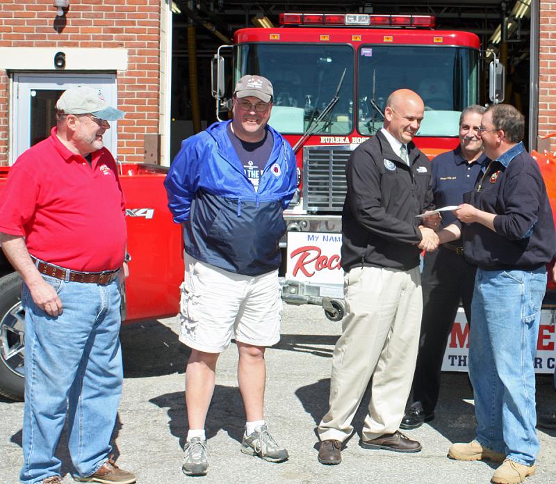 Lobster Board member John Focktman and Vice President Brian Plourde, President Tim Carroll, Thomaston Fire Chief Mike Leo (back) and Capt. Tony Leo. (Photo by Holly S. Edwards)