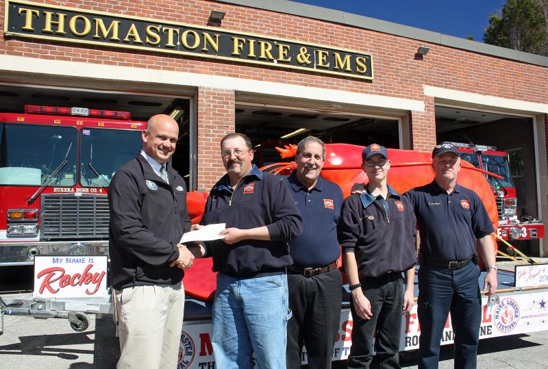 From left, Maine Lobster Festival Board President Tim Carroll, Thomaston Fire Capt. Tony Leo, Chief Mike Leo, and firefighters Sean Goodine and Floyd Lawrence. (Photo by Holly S. Edwards)