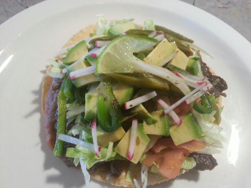 Sunfire Mexican Grill's Carna Asada Tostada topped with nopales and avocado (Facebook screengrab courtesy Sunfire Mexican Grill)