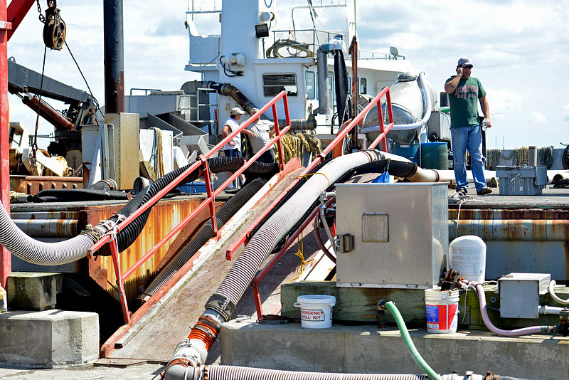Two crewmen down in the hold of the fishing vessel ‘Starlight’ were overcome by poisonous hydrogen sulfide Friday afternoon. (Photo by Ron Hawkes)