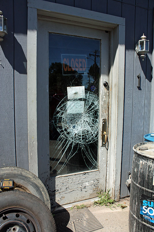 The third attempt into Camden Exxon resulted in shattered safety glass, but no hole. (Photo by Holly S. Edwards)