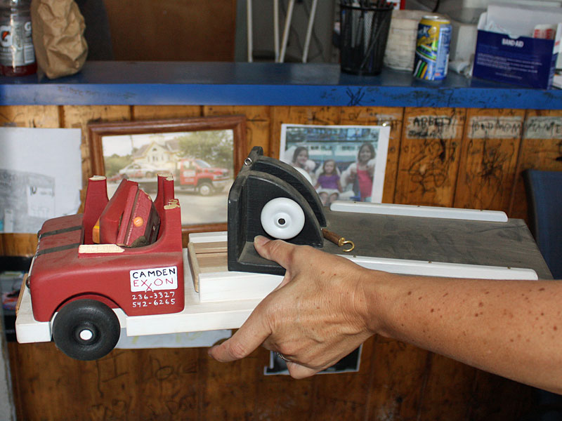 The frustrated burglar(s) took their anger out on Steve Laite's office/waiting room, shoving numerous items off shelves and the counter and breaking this truck, made by Laite's son. (Photo by Holly S. Edwards)