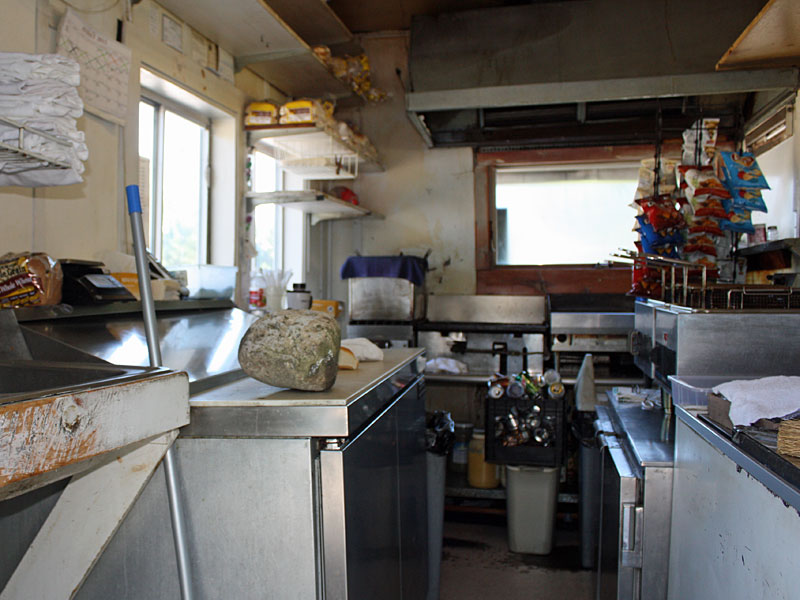 Tony Pike said the burglars only got away with change left in the cash register drawer, but he had to spend the morning cleaning up the mess left behind in their search. (Photo by Holly S. Edwards)