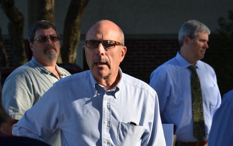 Tom Rodman, summer resident of Lincolnville, is one of the 24 investors behind Fox Hill Real Estate LLC, property owners of Fox Hill. On Sept. 18, the Camden Planning Board toured the site along with neighbors, attorneys, town planning office staff, and a representative of McLean Hospital, the Boston-based nonprofit that hopes to establish an alcohol and substance abuse facility at Fox Hill. Behind Rodman are Stephen Wilson, Camden’s planner and code enforcement officer, along with Camden’s attorney, William Kelly. (Photo by Lynda Clancy)