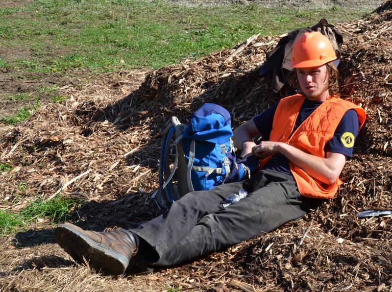 Jed Mason, of Norwich, Vt., is with the Maine Conservation Corps, taking a lunch break Saturday, Oct. 19. (Photo by Lynda Clancy)