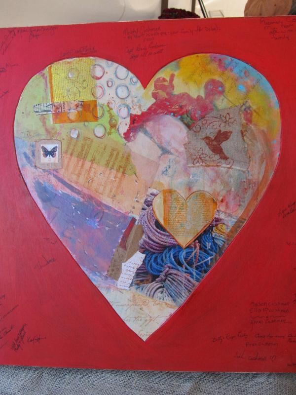 Artwork for the Gold family donated by artist Millie Donovan and signed by the community. (Photo by Kay Stephens)