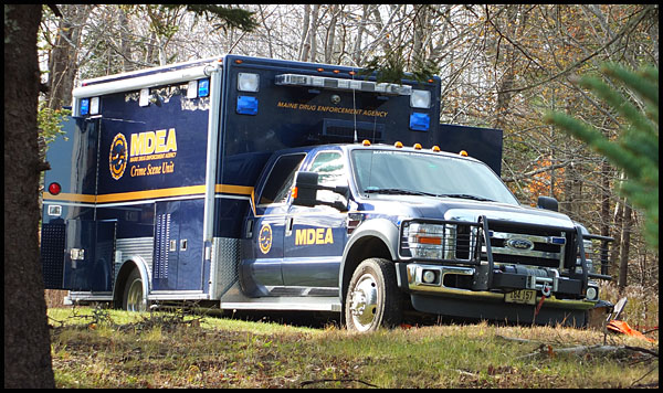 Agents with the Maine Drug Enforcement Agency arrived at the Owls Head residence around 10 a.m. this morning, Nov. 15. (Photo by Chris Wolf) MDEA meth drugs