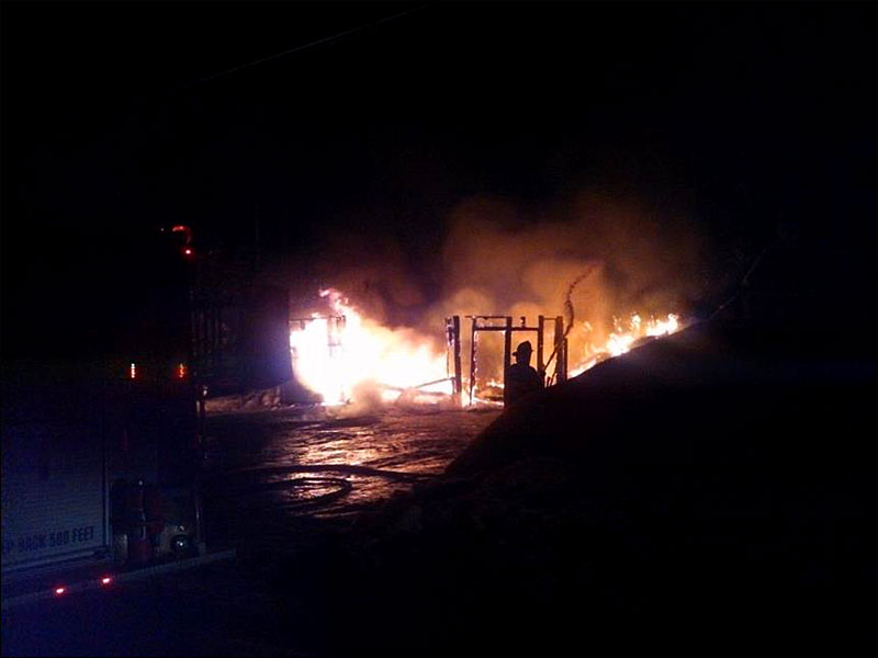 Explosions at the fire in Lincolnville Tuesday night were caused by ammunition and some fireworks stored inside the garage that burned.