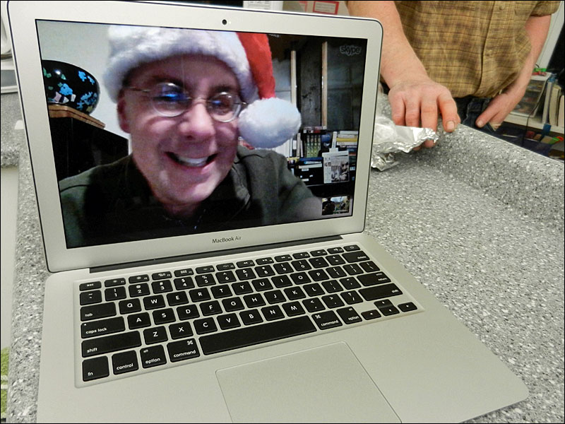 The Rev. Rob Benson, of Maine Sea Coast Mission’s Island Outreach, ‘attends’ the open house via Skype. (Photo by Eva Murray)