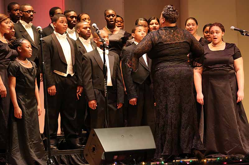 All eyes on the choir director, the Rev. Chantel Wright. (Photo by Marti Stone)