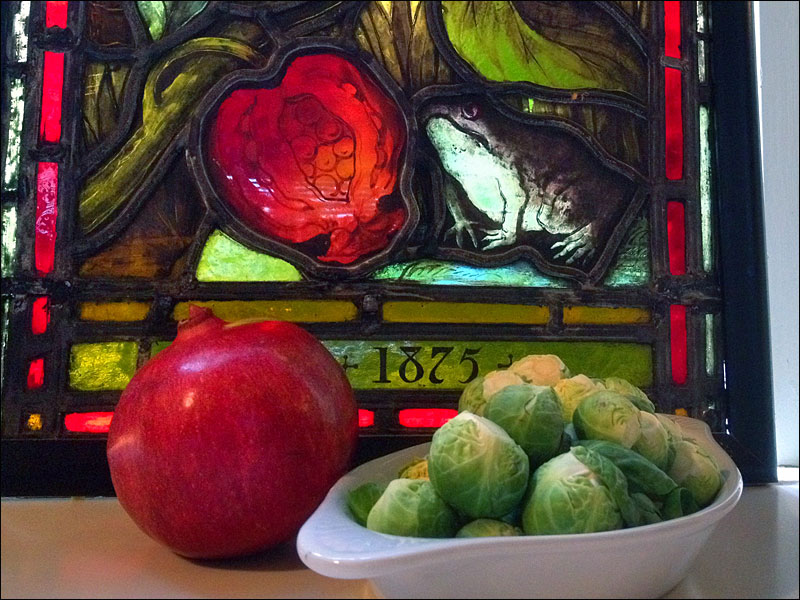 ‘In our kitchen we have a stained glass window, dated 1875, which features pomegranates (and a frog).’