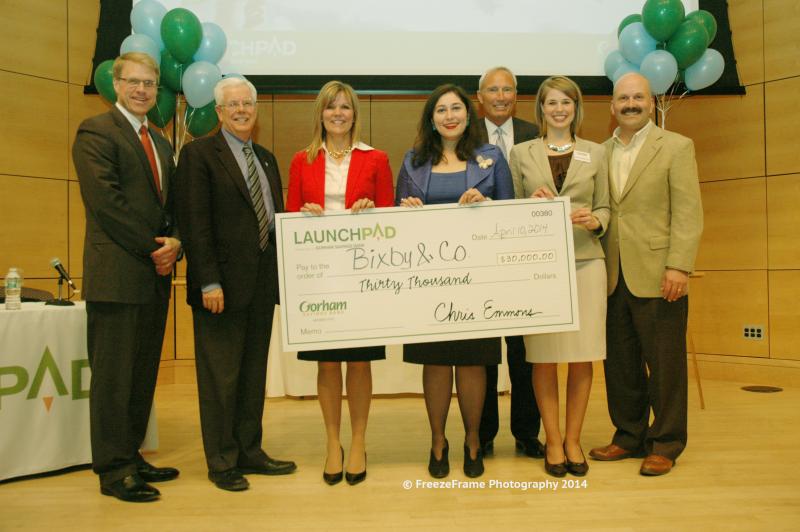 Kate McAleer holds the winning check after last night’s awards in Gorham Savings Bank’s LaunchPad business competition. (Courtesy Gorham Savings Bank)