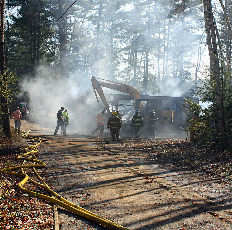 garage holly sunday leeman down palermo arm road fire edwards destroyed unpermitted fires burn backhoe remains tear begins updated standing