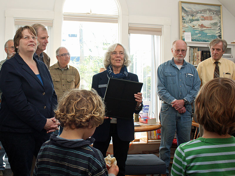 Rep. Joan Welsh (D-Rockport) reads a Maine 126th Legislature proclamation recognizing the Rockport Public Library’s 100th anniversary May 30. (Photo by Holly S. Edwards)