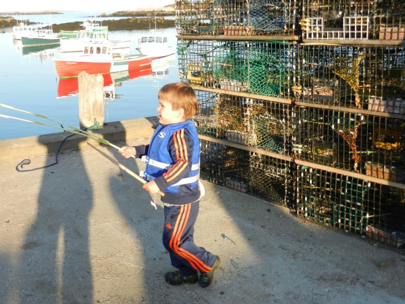 Gavin, 3, enjoys the steel pan concert on Matinicus.