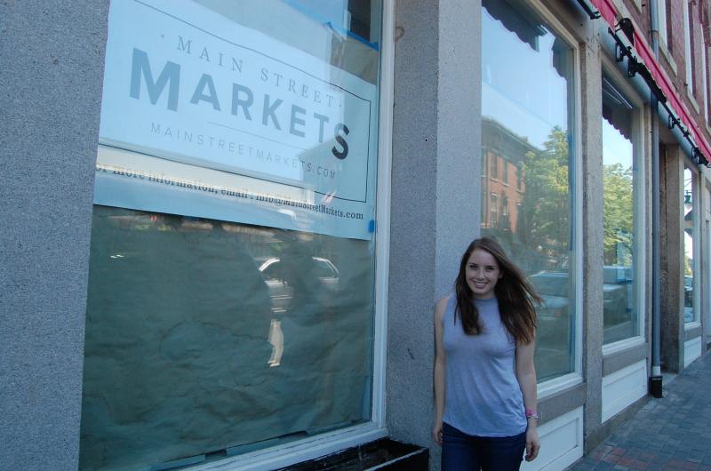 Jennifer Rockwell in front of Main Street Markets