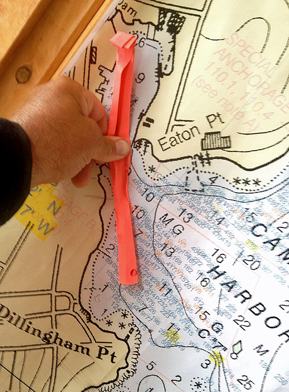 Camden Harbormaster Steve Pixley shows the route the Kohiki took from its mooring to where it came to rest in the mud at low tide during last night’s storm.