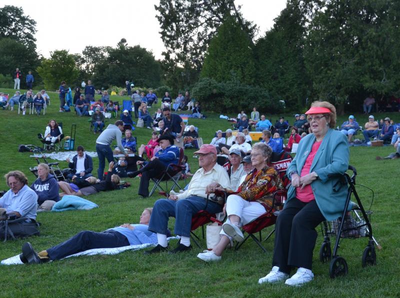 A crowd gathers to relax and enjoy the entertainment at the Windjammer Festival Talent Show Friday night, Aug. 29. (Photo by Lynda Clancy)