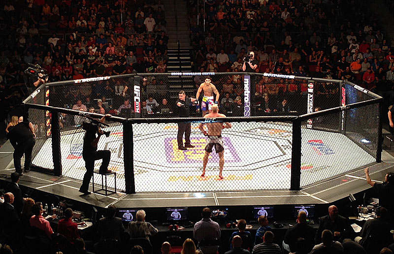 Tim Boetsch, back to, and Brad Tavares, facing, await for the referee’s signal to begin the fight. (Courtesy Kristen Robertson)