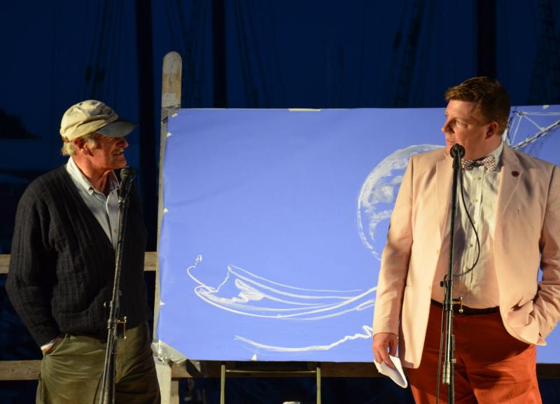 Capt. Jim Sharp and Dan Bookham – in yachtsman’s garb (aka red pants) regale the stage at the Windjammer Festival Talent Show. (Photo by Lynda Clancy)