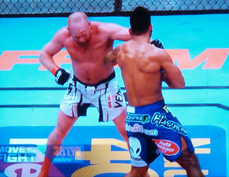 Lincolnville native Tim Boetsch’s (left) winning move to knockout Brad Tavares in the second round of UFC’s first ever Maine fight on Aug. 16 at the Cross Insurance Center. (Photo by George Harvey)