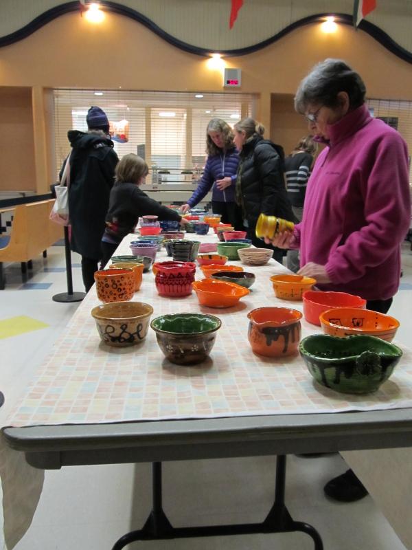 Original bowls made, and filled with hot soup, by students to be given in exchange for an $8 donation. (Photo by Kay Stephens)
