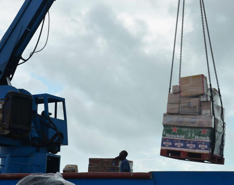 Unloading lots of beer for Homecoming, a three-day festival on the island. (Photo by Lynda Clancy)