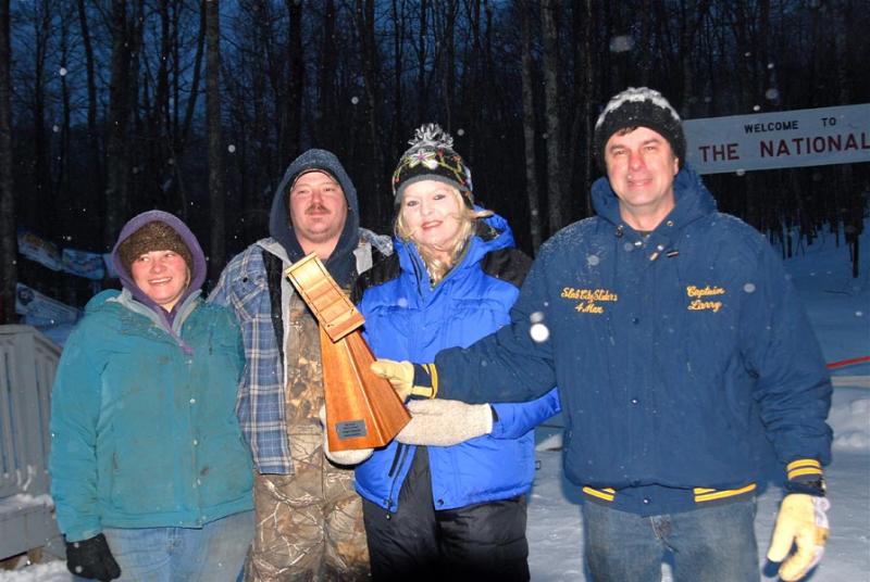 The Slab City Sliders of Lincolnville are the new reigning World Champions, having bested a field of nine returning 4-Person division first place winners in a one-run-takes-all race Sunday during the 25th U.S. National Toboggan Championships. (Photo by Dave Ridley)