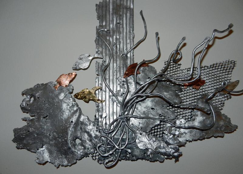 Details of Blair Clement’s ‘Cross of Found Objects’ inside the Matincius Island church. (Photo by Eva Murray)