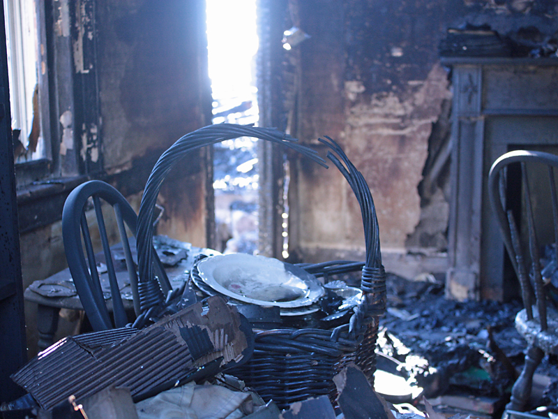 This room, closest to where the fire is believed to have started, in the kitchen to the left, sustained a lot of fire and water damage as well. (Photo by Holly S. Edwards)