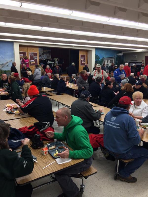 An early morning breakfast at Columbia Falls before the convoy takes off. (Photo by Justin Hills)