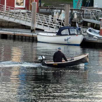 Early morning riser in Camden Harbor. (Photo by Holly S. Edwards) Camden Harbor Skiff Boat