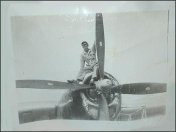 Kert Ingraham atop one of the engines of the Enola Gay. (Photo courtesy Kurt Ingraham)