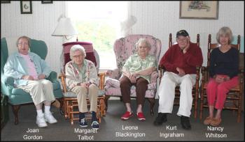 Kert Ingraham, second from right, pictured with the residents of 63 Washington St. in Camden. not pictured is resident Bob Seavey. (Photo by Chris Wolf)