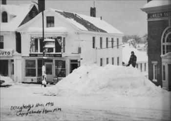 In 1956, a snow storm filled downtown Camden and the front of then-Dougherty's, now Cappy's Chowder House, with piles of snow. A barber shop was upstairs then.