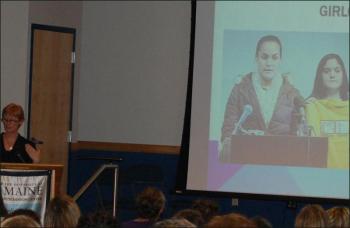 Colby College professor Lyn Mikel Brown discusses commercialization of girlhood and shares examples of girls who have taken stands against offensive products, advertising, and commercial messages through "girlcotts." (Photo by Kathleen Meil)