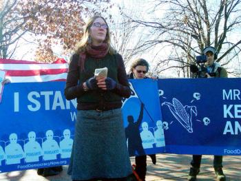 Holli Cederholm of the Washington, Maine-based Organic Seed Growers and Trade Association and Proud Peasant Farm speaks at a rally in Washington, D.C., following a hearing in a federal appeals court in a lawsuit brought by OGSATA against multinational agricultural corporation Monsanto. (Photo Courtesy of Adam Eidinger) Holli Cederholm of the Washington, Maine-based Organic Seed Growers and Trade Association (Photo by Adam Eidinger)