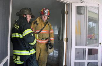From left, Rockland Fire Chief Charlie Jordan and Rockport firefighter Bill Lane. (Photo by Holly S. Edwards)