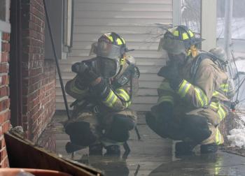 Firefighters from Hope, Lincolnville and Rockport are joining Camden Fire Department at the former Louts Restaurant on Route 1 Sunday for a series of controlled training fires inside the structure. Around 6 p.m. tonight, the building will be lit for a final time and burned to the ground. ((Photo by Holly S. Edwards))