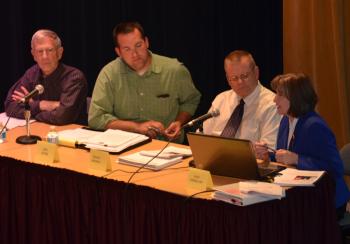 Rockport Interim Town Manager Roger Moody, Hope Town Administrator Jon Duke, Lincolnville Town Administrator David Kinney and Camden Town Manager Patricia Finnigan all sat on the four-town emergency medical services review team, along with seven selectmen and one citizen, poring over four competing proposals from EMS/ambulance service companies. (Photo by Lynda Clancy)