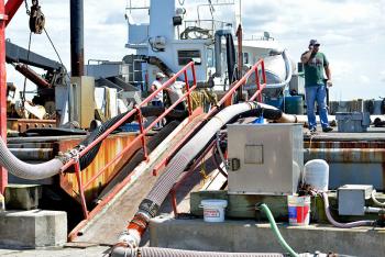Two crewmen down in the hold of the fishing vessel ‘Starlight’ were overcome by poisonous hydrogen sulfide Friday afternoon. (Photo by Ron Hawkes)