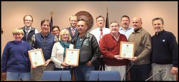 The City of Rockland recognized several organizations at its Nov. 13 meeting for their economic and community contributions. From left: Stacey Palmer with Maine Boats, Homes and Harbors; Councilor Larry Pritchett; John Hanson owner of Maine Boats, Homes and Harbor, Councilor Lizzy Dickerson; Jean Benjamin; Mayor Will Clayton; Blues Festival Producer/Organizer Paul Benjamin; Councilor Eric Hebert; Lobster Festival President Elect Chuck Kruger; Councilor Frank Isganitis; Outgoing Lobster Festival President Tim Carroll; and Maine Lobster Festival Vice President Elect John Jeffers.