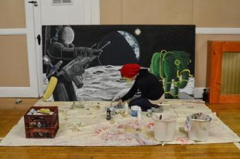 Lindsay working on her giant mural for Hope Elephants. Courtesy Lindsay Parker