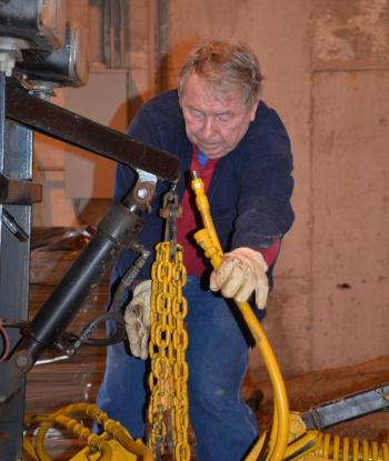 Steve Beveridge doing what he has done since 1966 — making things work. (Photo by Lynda Clancy)